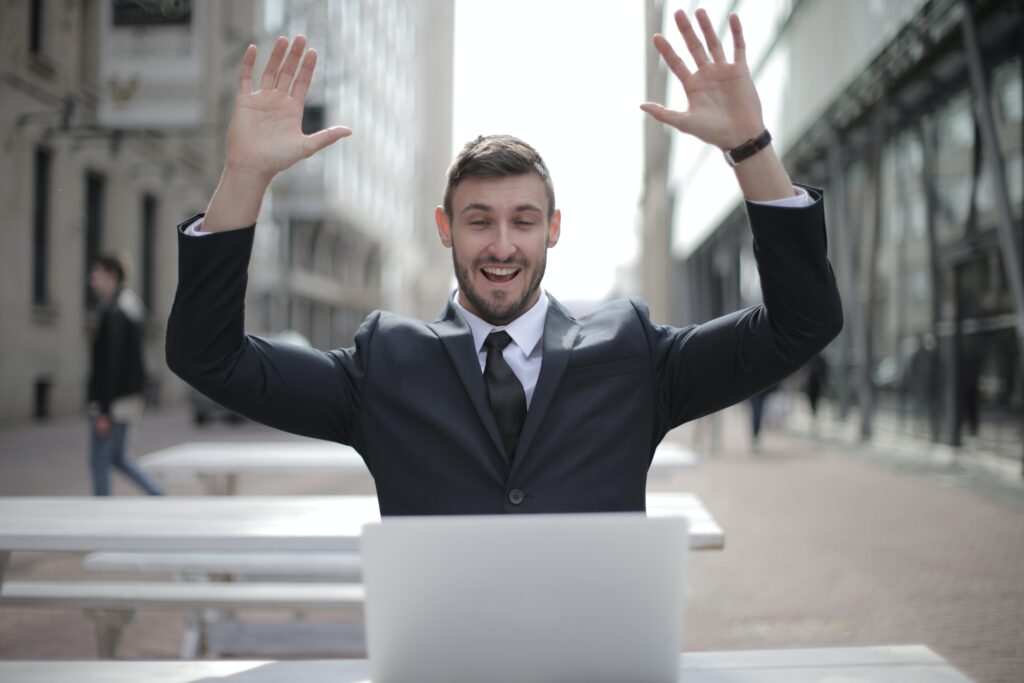 Happy business owner because of management consulting