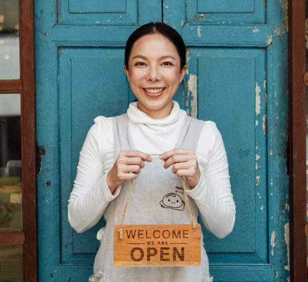 happy woman opening business